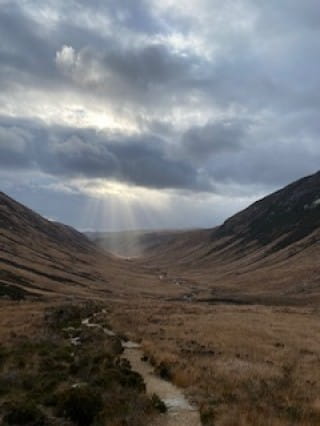 Moody skies in Glen Rosa's ever-changing landscape