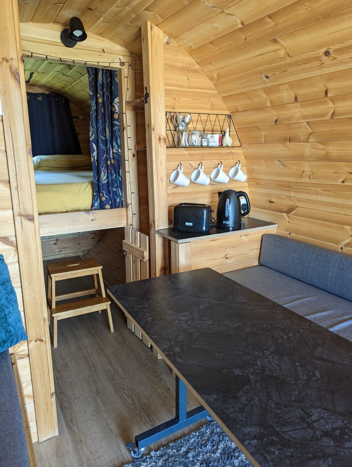 Indoor table stowed under the bed