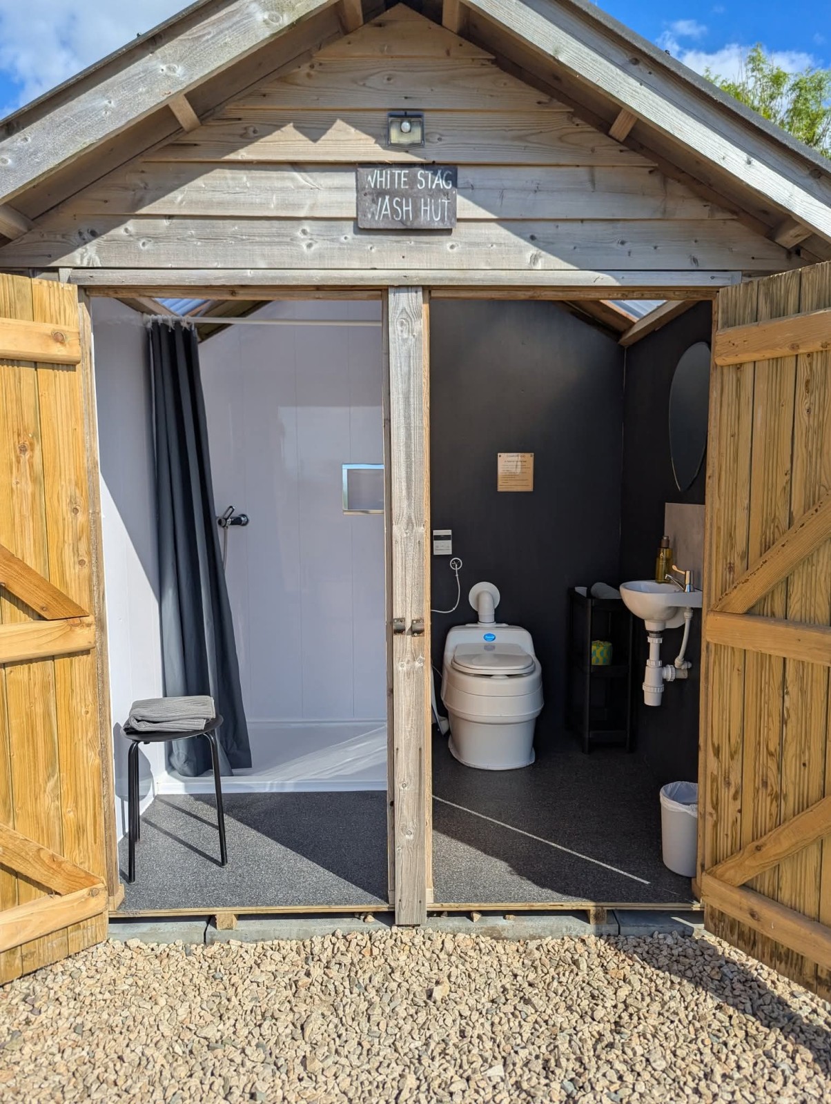 Private wash hut next to pod