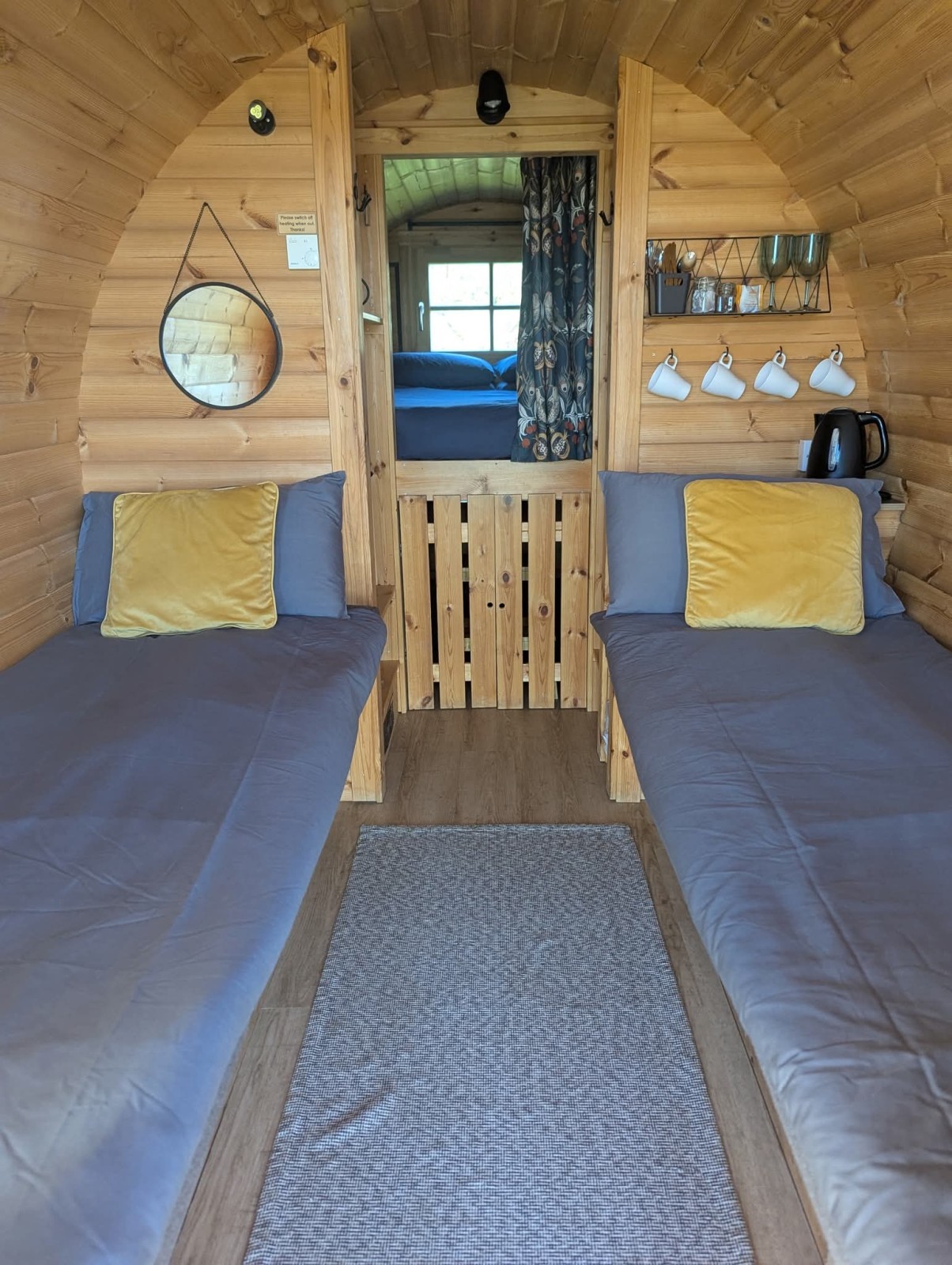 Single beds set up from day-time benches