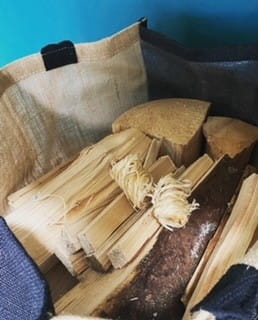 We sell wood bags with a mix of wood, kindling and fire lighters