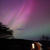 Pods under Aurora Borealis