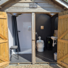 Private wash hut next to pod