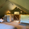 Upper level storage and chill-out cushion zone