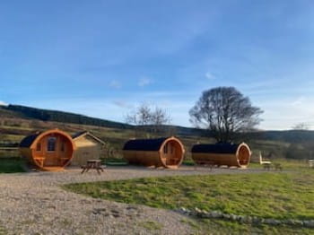 three glamping pods